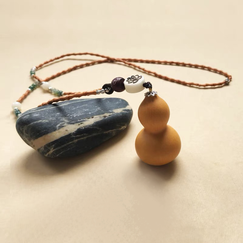 Eight Treasures Gourd Necklace with Bamboo-Shaped Wooden Beads
